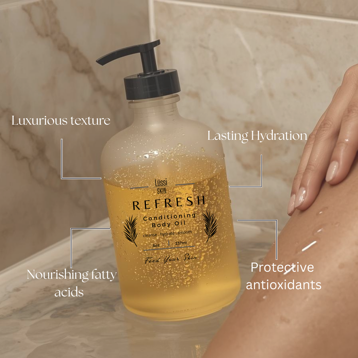 Bottle of Refresh body oil with a hand applying it to skin, set against a marble bathroom background.