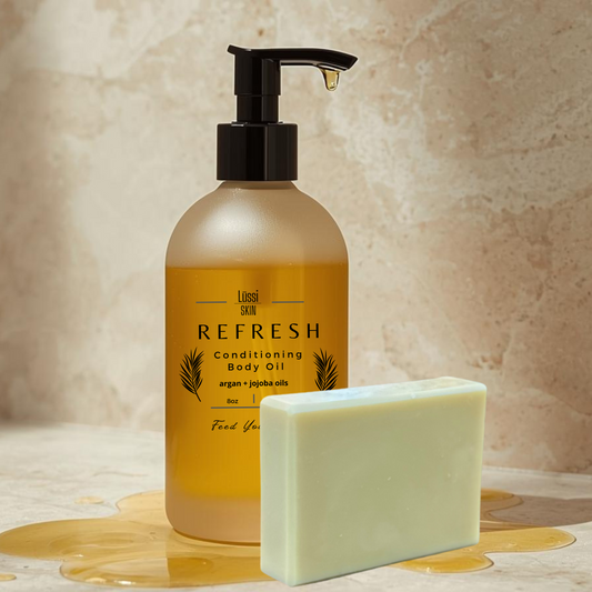 Body oil bottle and soap on a neutral background